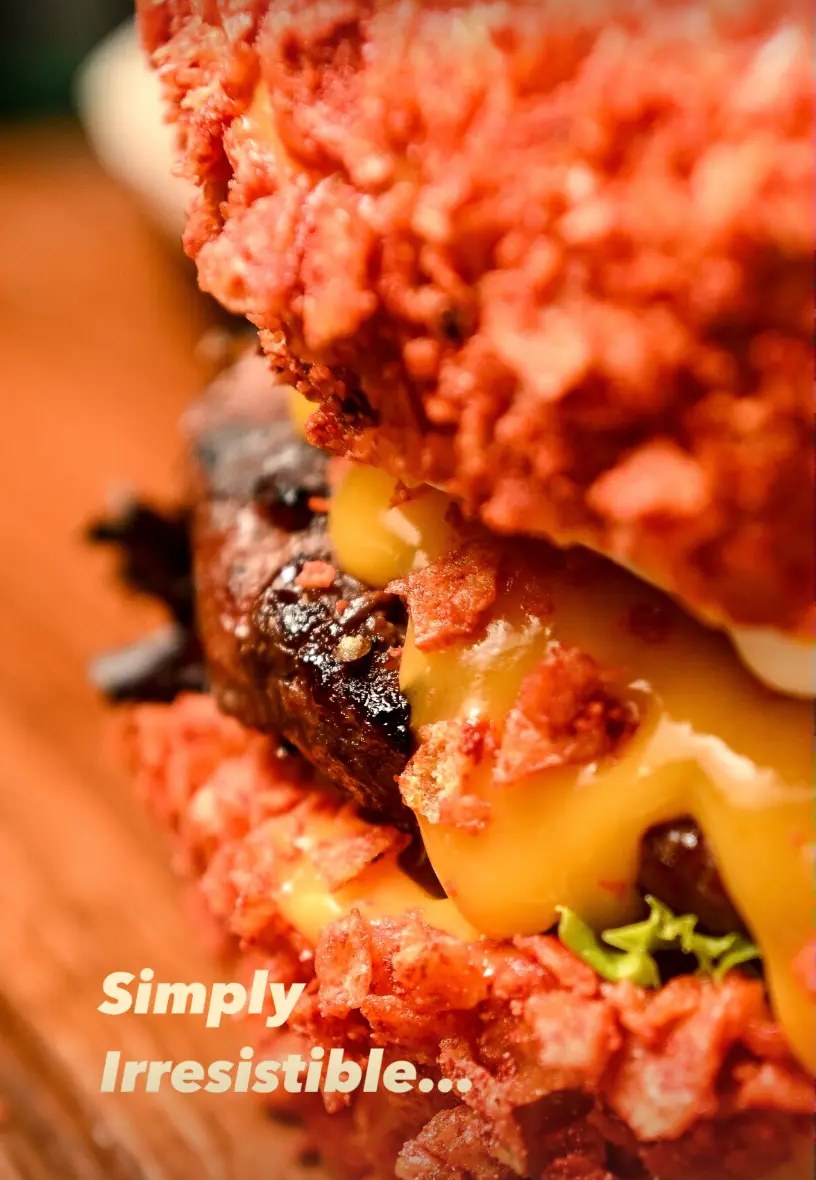 Crispy chicken and beef stack with melted cheese